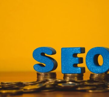 SEO money concept - image of stacked dollar bills with SEO text, representing making money with SEO marketing strategies.